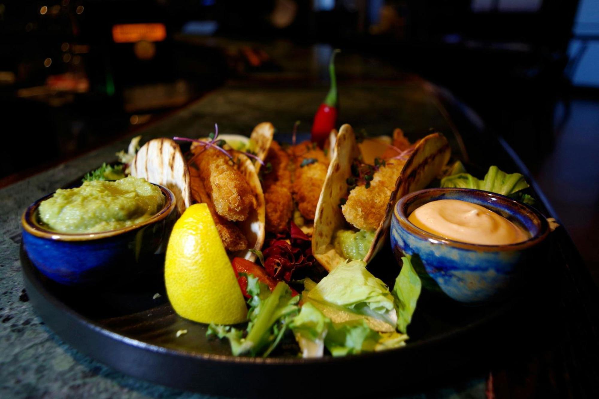 Sheraton Poznan Hotel Exterior photo A plate of tacos